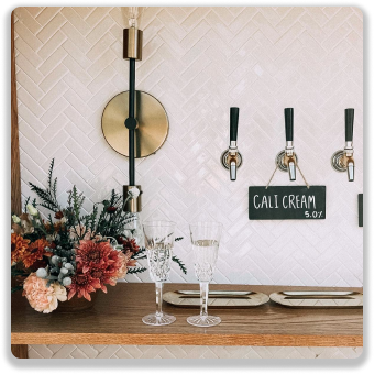 Cali Cream taps and floral arrangement